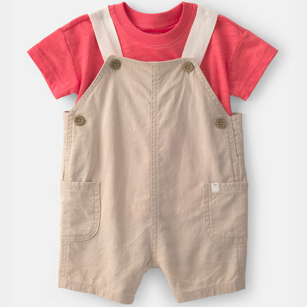 Children's outfit with red shirt and beige overalls on a white background