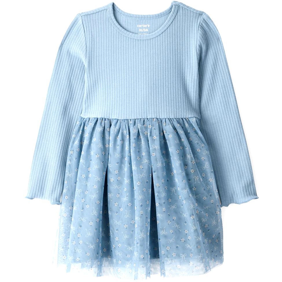 Light blue dress with a textured top and star-patterned skirt on a white background