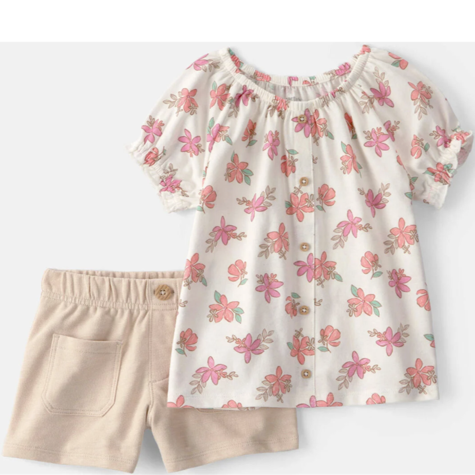 Floral top and beige shorts set on a white background