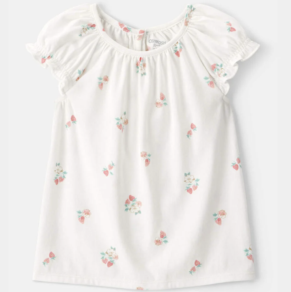White blouse with floral embroidery on a white background