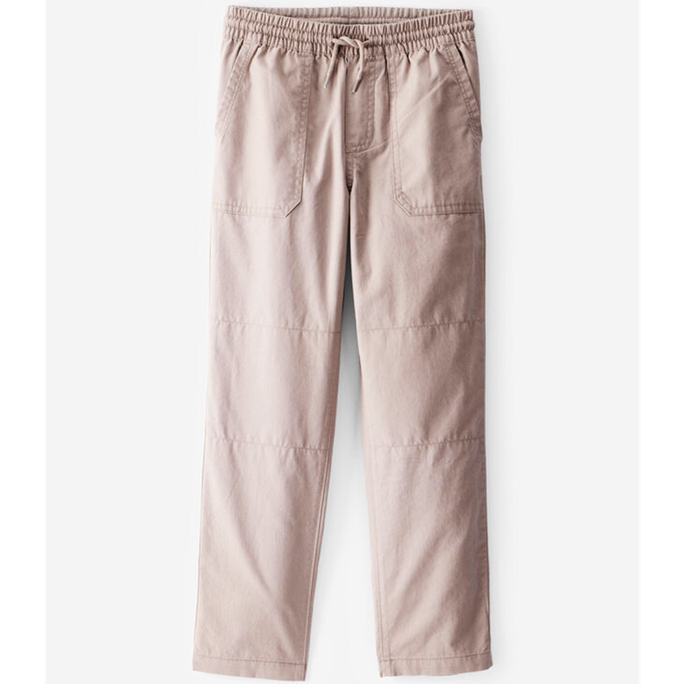 Light tan pants with drawstring waist on a white background