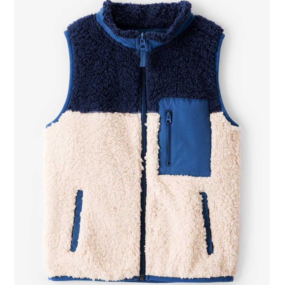 Navy and beige fleece vest with blue accents on a white background
