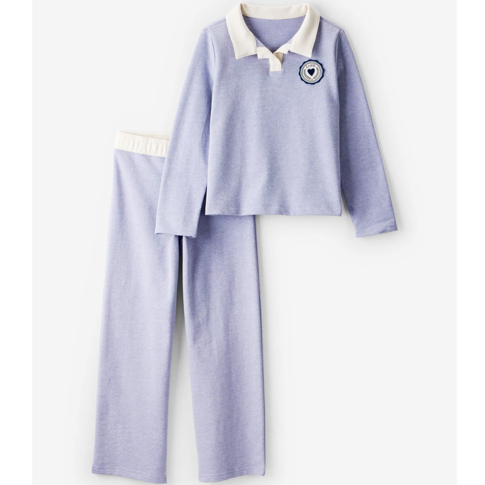 Light purple pajama set with a white collar on a white background