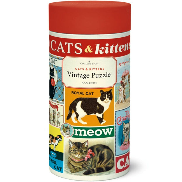 Jigsaw puzzle box with cat-themed design on a white background