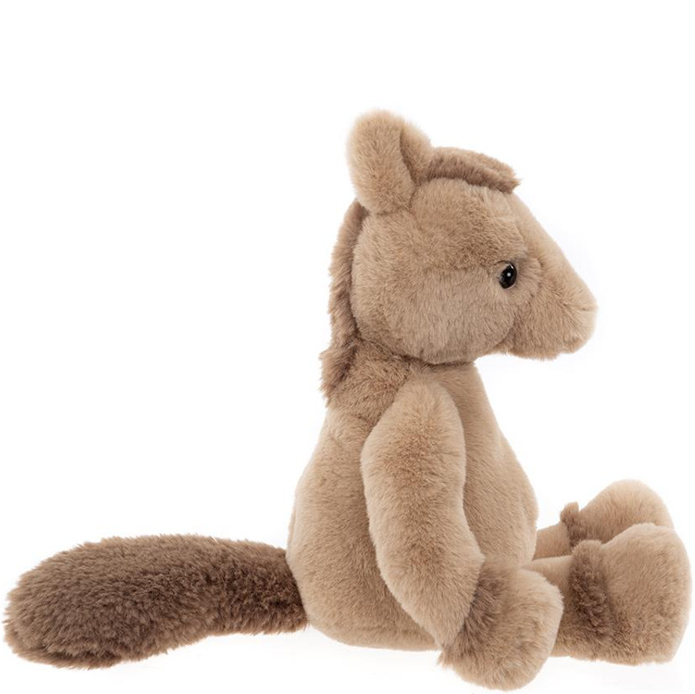 Plush pony toy on a white background