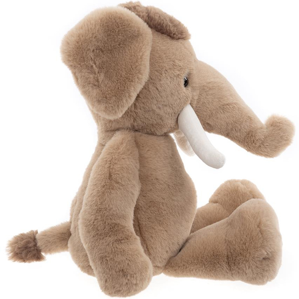 Plush mammoth toy on a white background