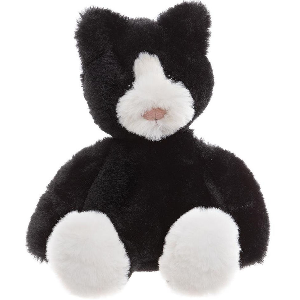 Black and white plush toy cat on a white background