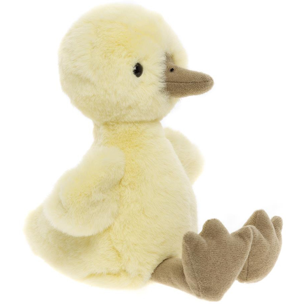 Plush toy duckling on a white background