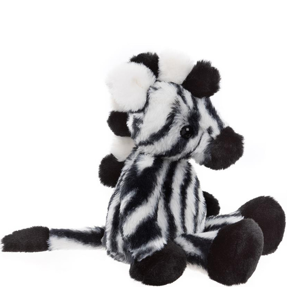 Plush toy zebra with black and white stripes on a white background