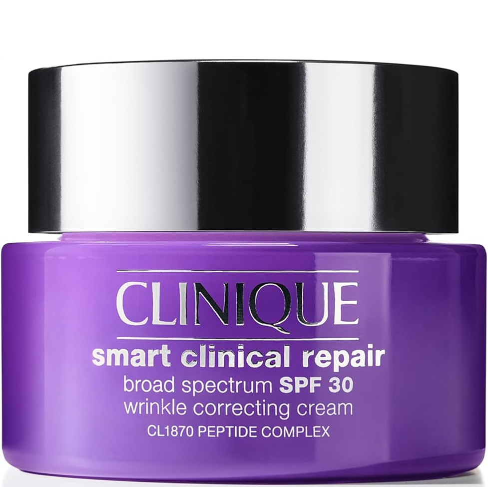 Clinique smart clinical repair cream jar with purple body and silver lid on a white background