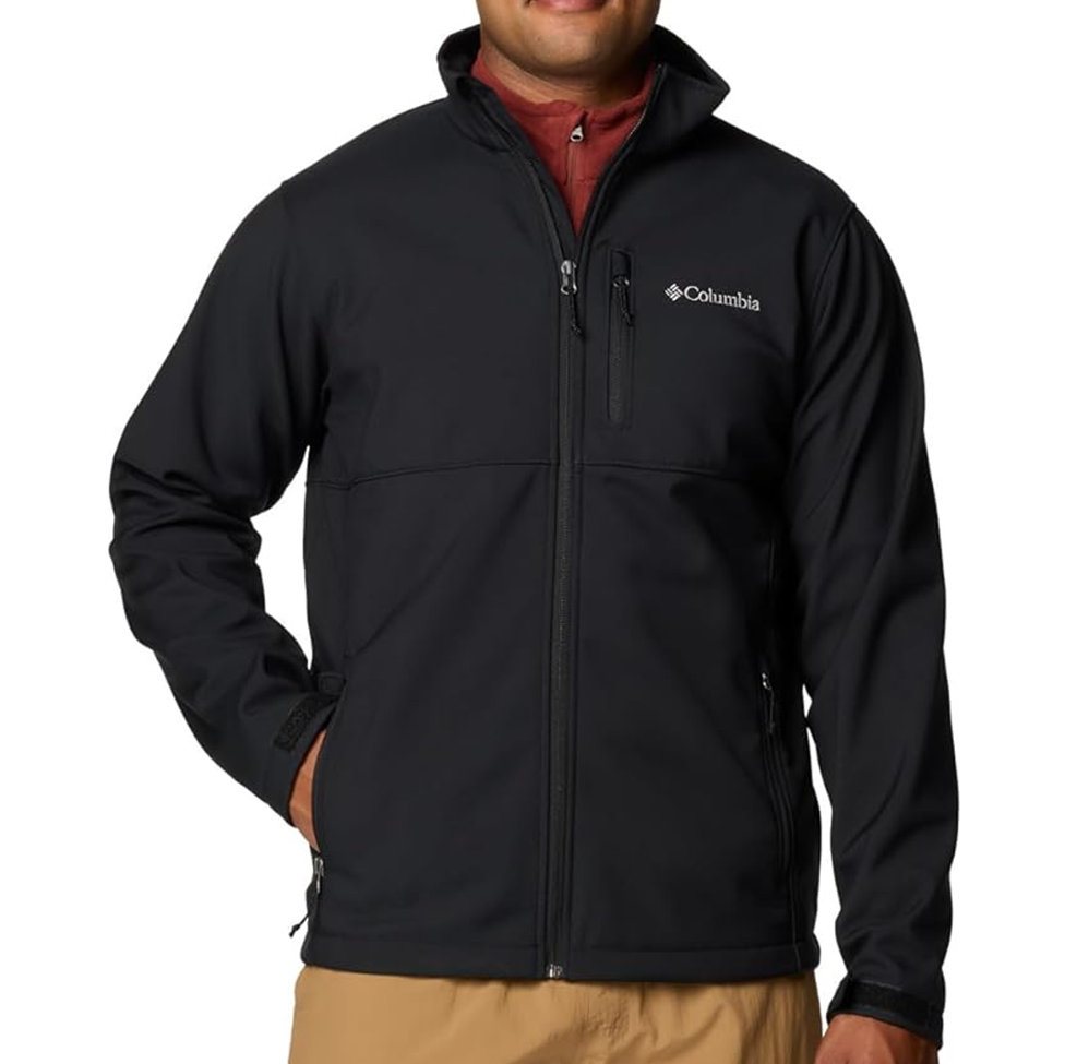 Black jacket with Columbia logo worn by a person on a white background