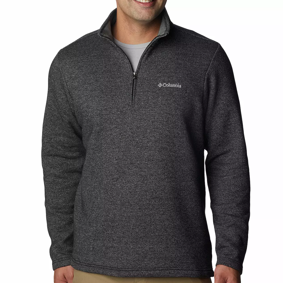 Man wearing a Columbia branded gray pullover on a white background