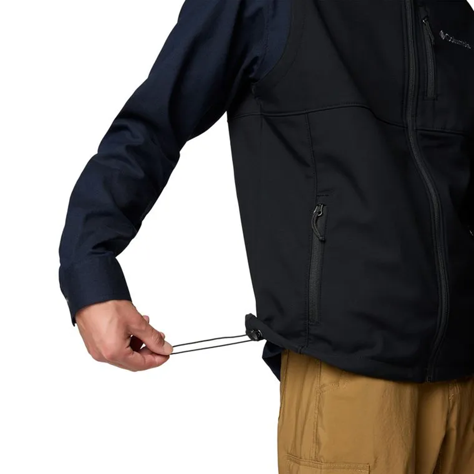 Person wearing a black jacket with a white background