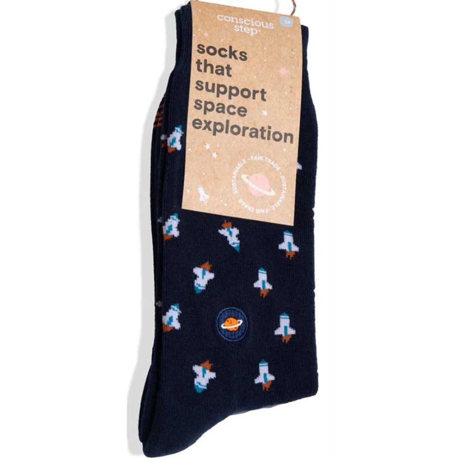 Navy sock with space-themed design and 'conscious step' label on a white background