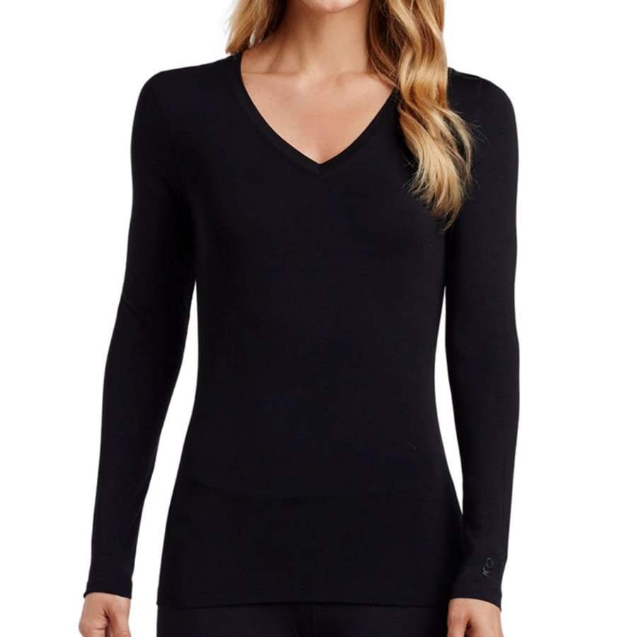 Black long-sleeve top worn by a person on a white background