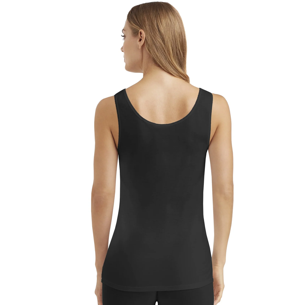 Woman wearing a black tank top on a white background