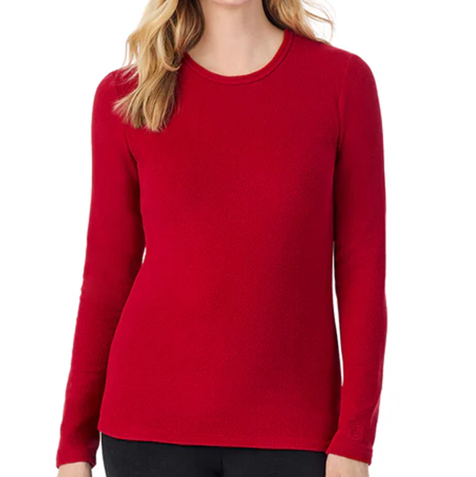 Red sweater worn by a person on a white background