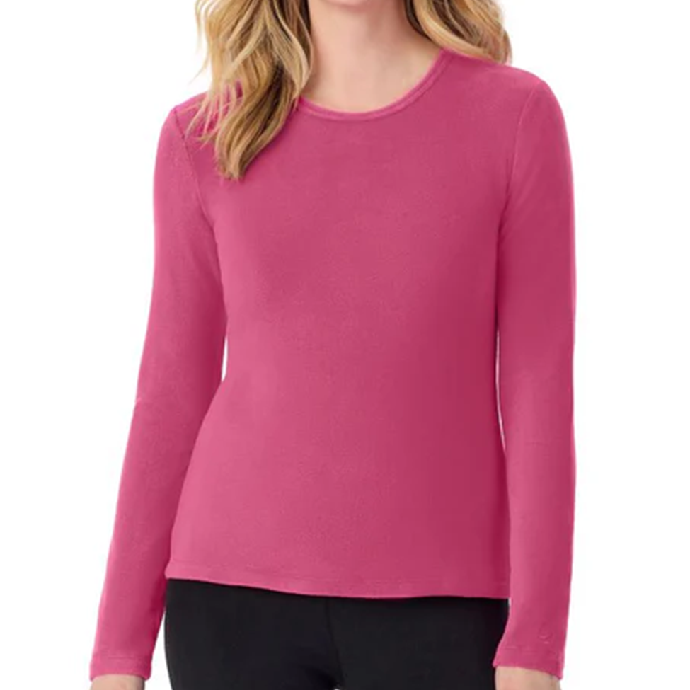 Pink long-sleeve shirt worn by a person on a white background
