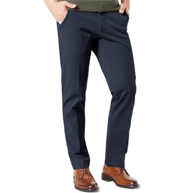 Navy blue pants worn by a person on a white background