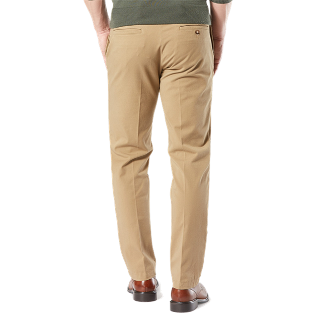 Beige pants worn by a person on a white background