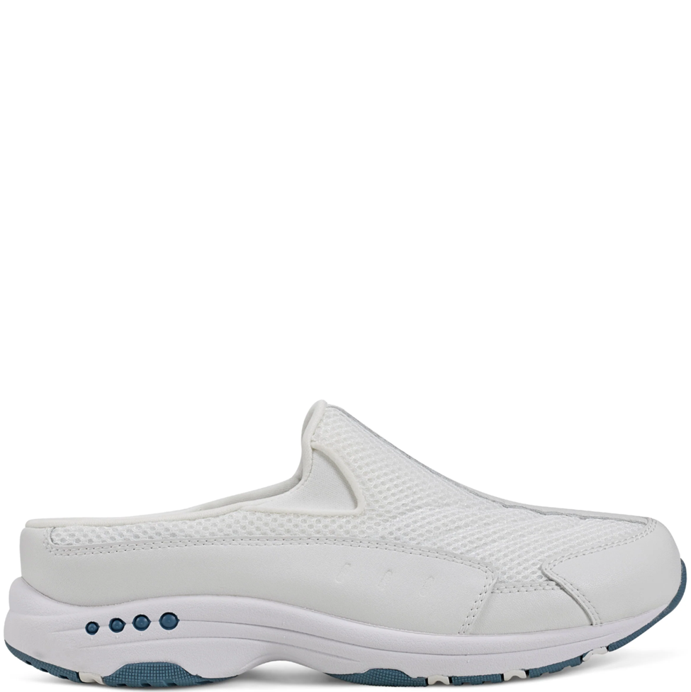 White slip-on shoe with blue sole on a white background