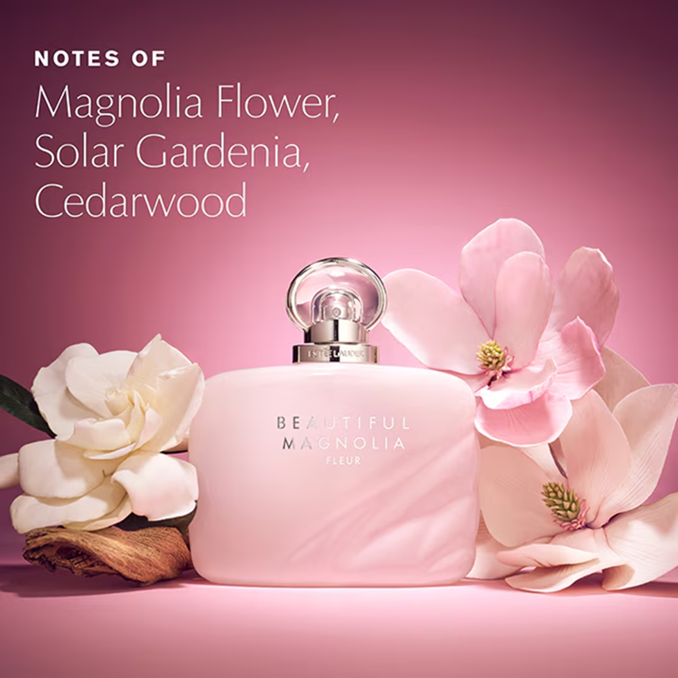 Pink perfume bottle with flowers on a pink background