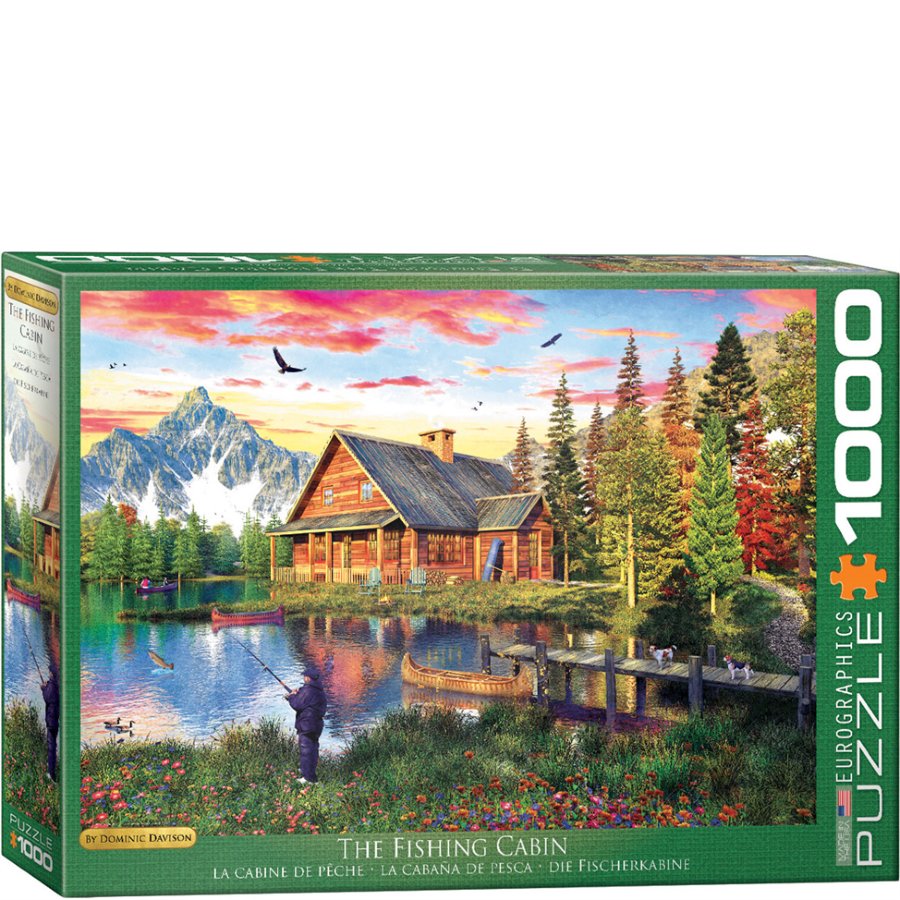 Jigsaw puzzle box featuring a scenic cabin by a lake with mountains in the background.