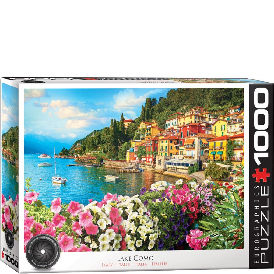 Jigsaw puzzle box featuring Lake Como with colorful buildings and flowers.