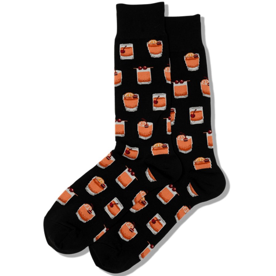 Black socks with cake pattern on a white background
