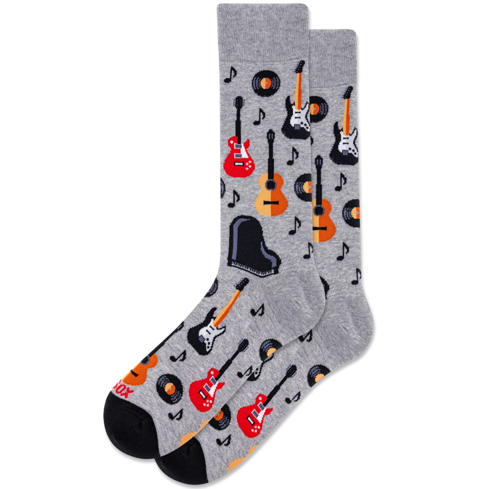 Gray socks with guitar and music note pattern on a white background