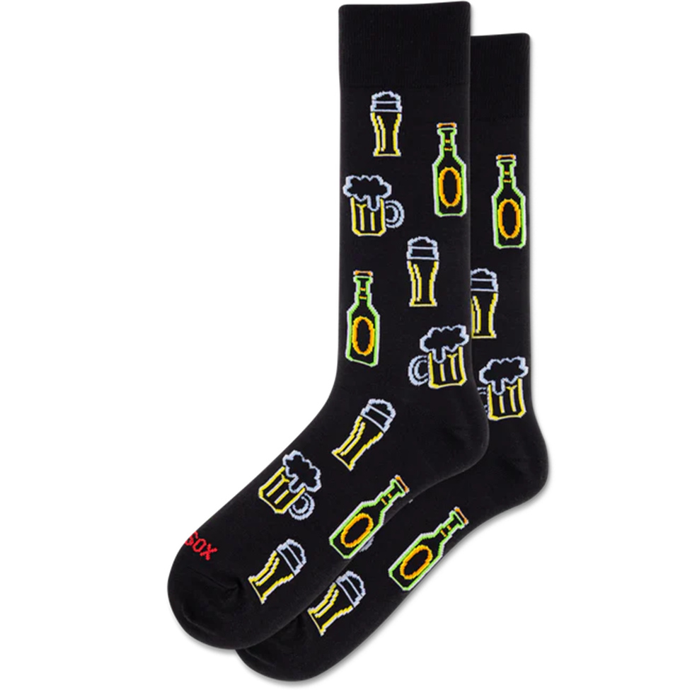 Black socks with beer-themed designs on a white background