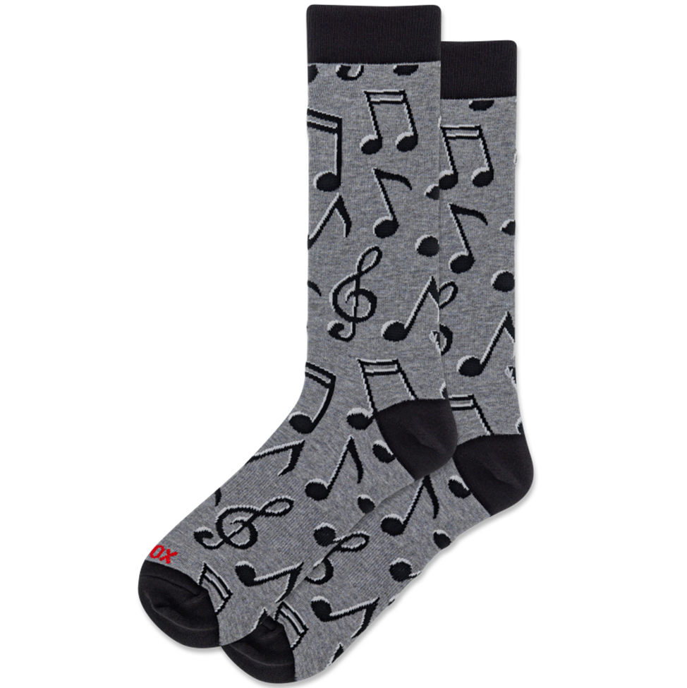 Gray socks with music note pattern on a white background