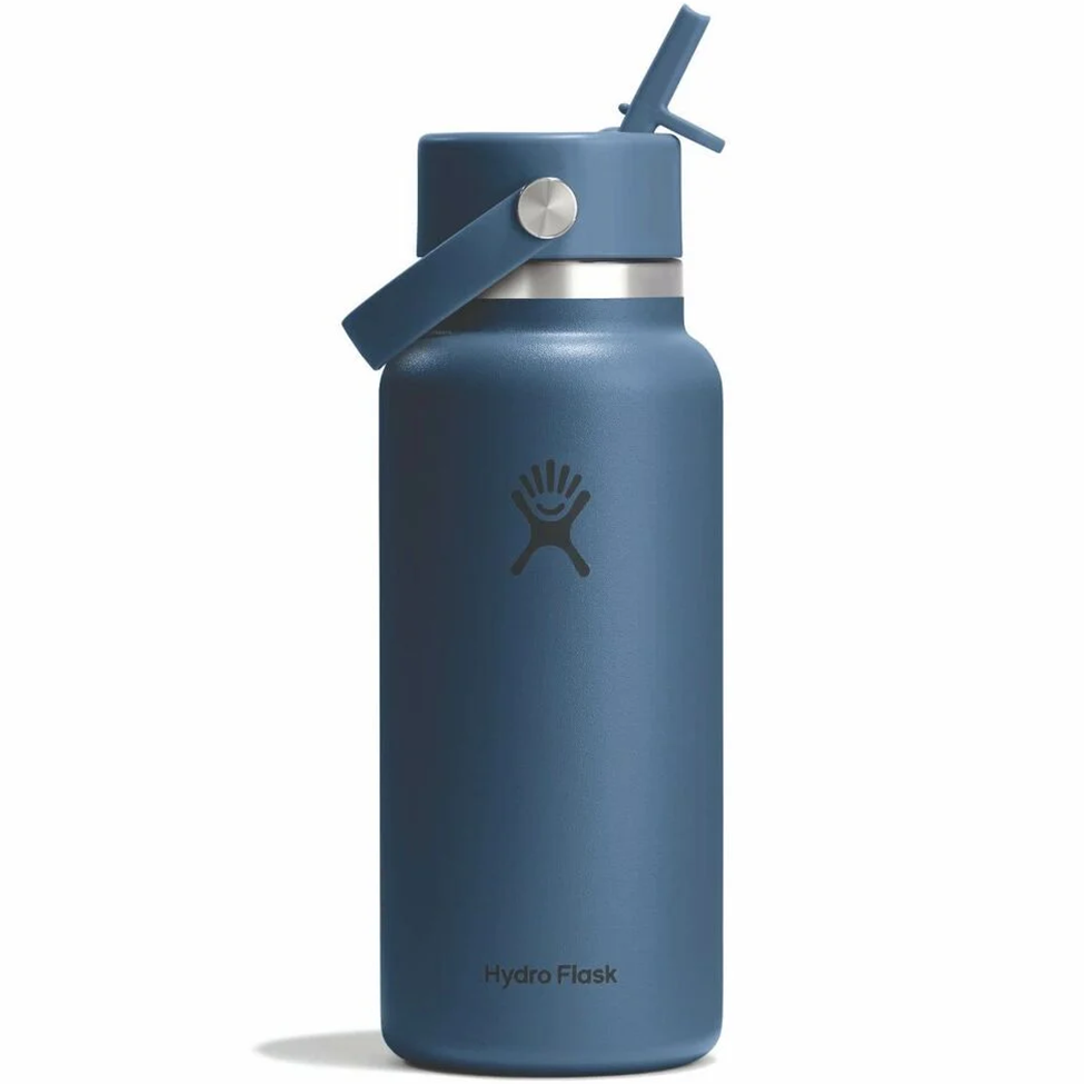 Blue Hydro Flask water bottle with straw lid on a white background