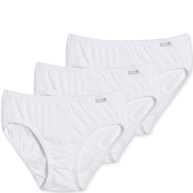 Three pairs of white underwear on a white background