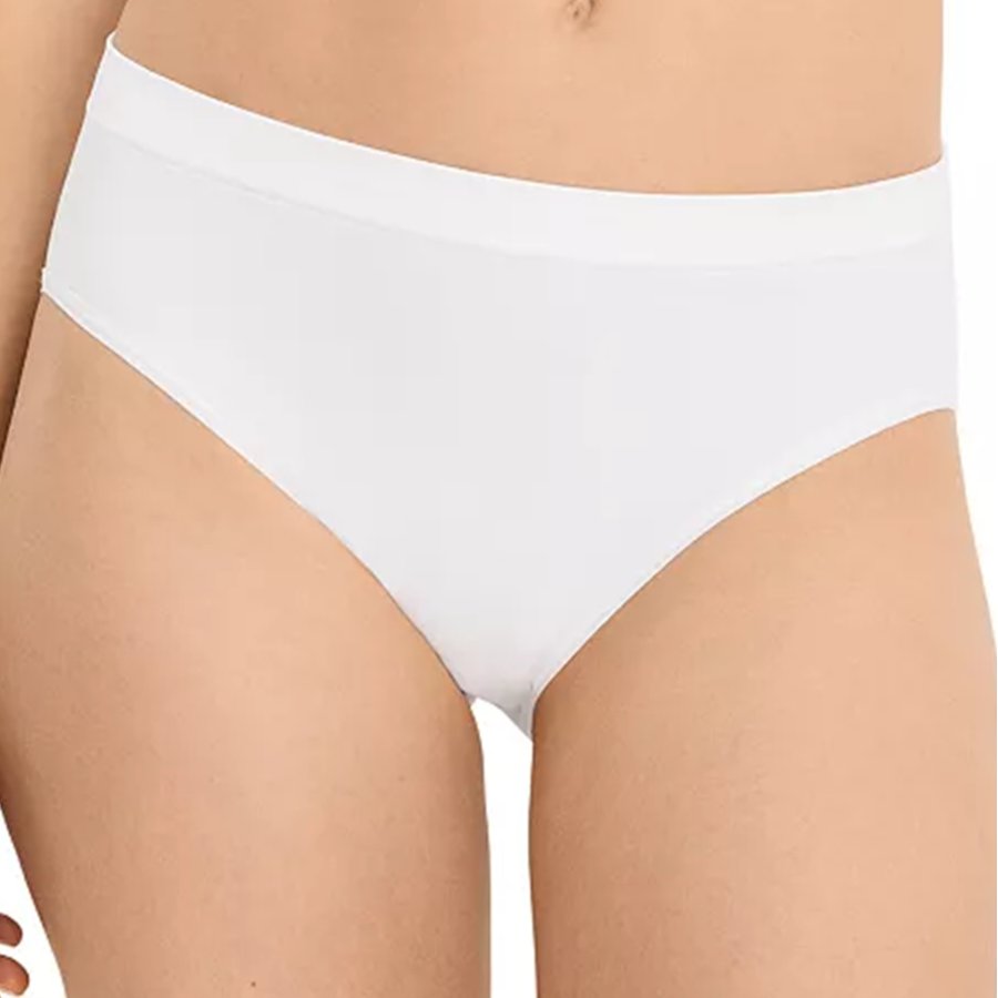 White underwear worn by a person on a plain background