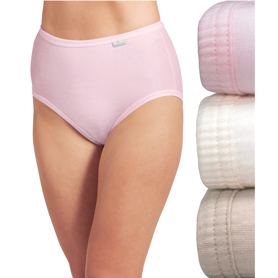 Pink women's underwear with a close-up of the fabric on a white background