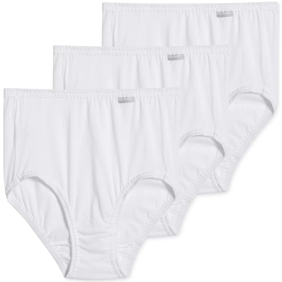 Three pairs of white  women's underwear on a white background