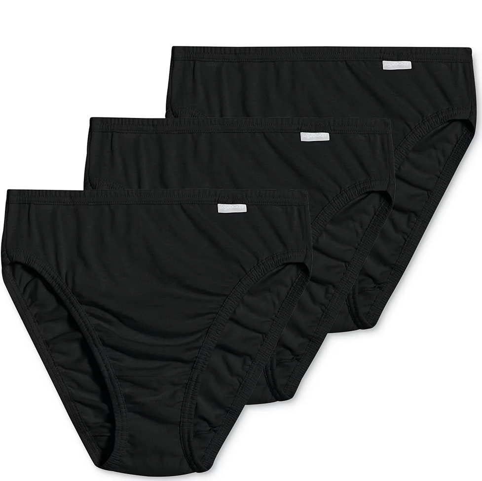 Four pairs of black women's underwear on a white background