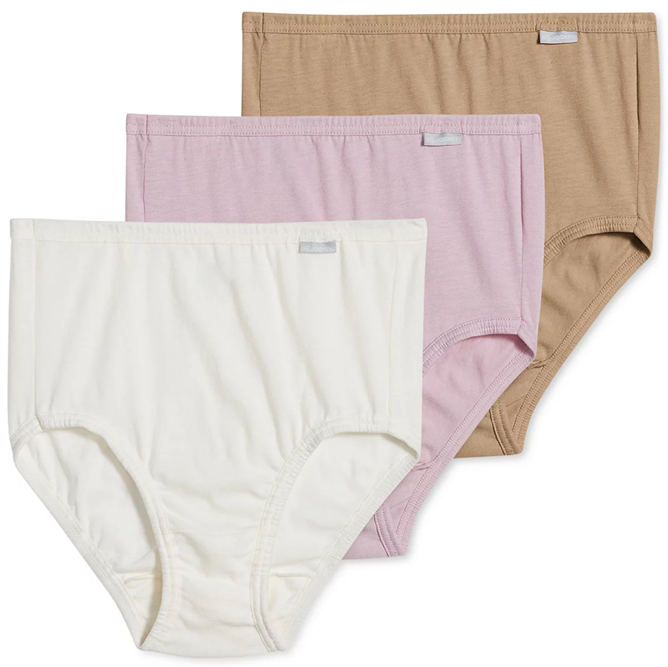 Three pairs of women's underwear in beige, pink, and white on a white background.
