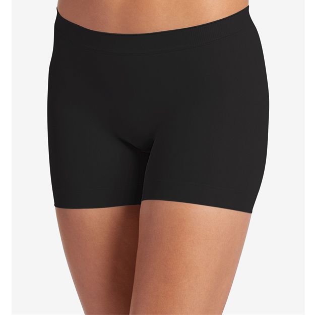 Black shorts worn by a person on a white background