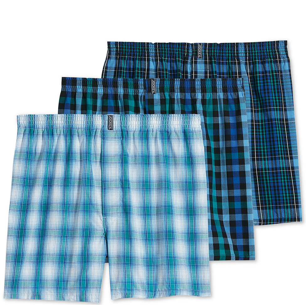 Three pairs of plaid boxer briefs on a white background