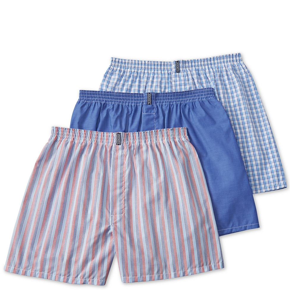 Three pairs of men's boxer shorts in different patterns on a white background