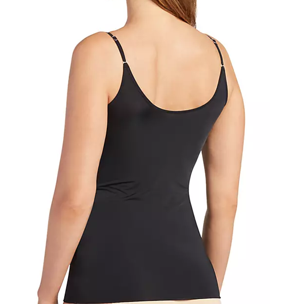 Black tank top worn by a person on a white background