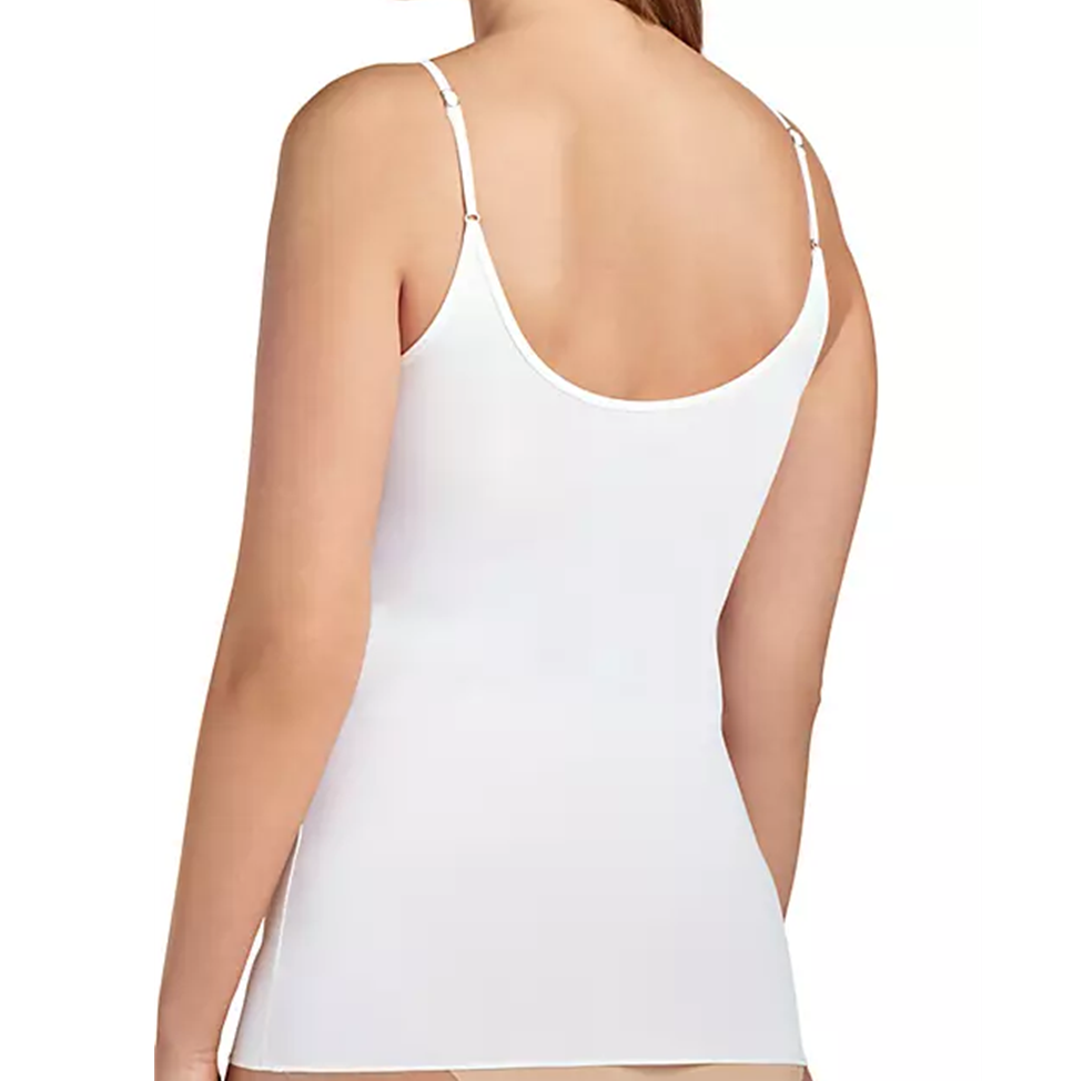 White camisole worn by a person on a white background