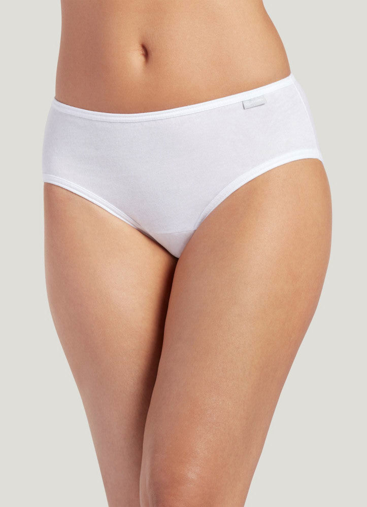 White underwear worn by a person on a plain background