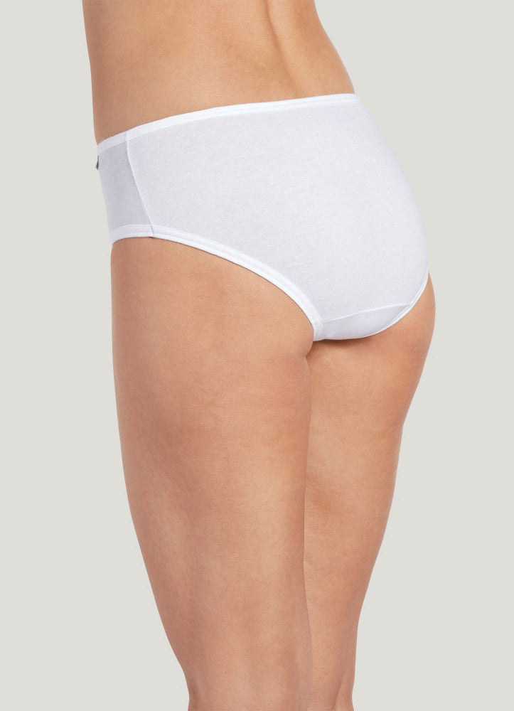 White underwear worn by a person on a plain background