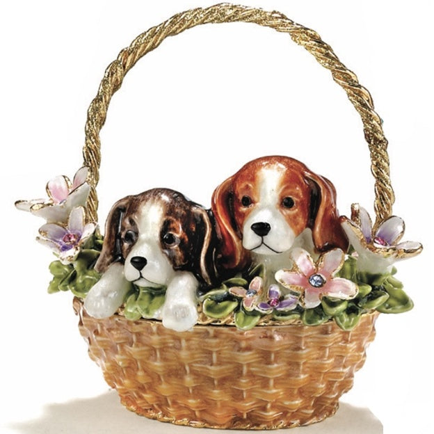 Decorative figurine of two dogs in a basket with flowers on a white background
