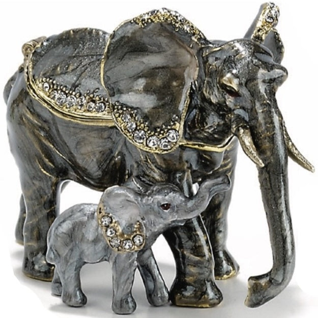 Decorative figurine of two elephants with decorative trunks on a white background