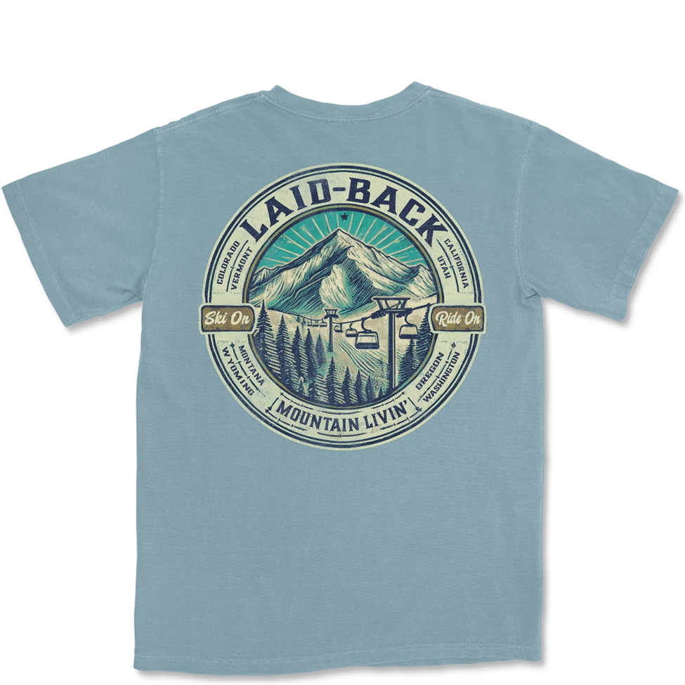 Light blue t-shirt with mountain graphic and 'Laid-Back' text on a white background