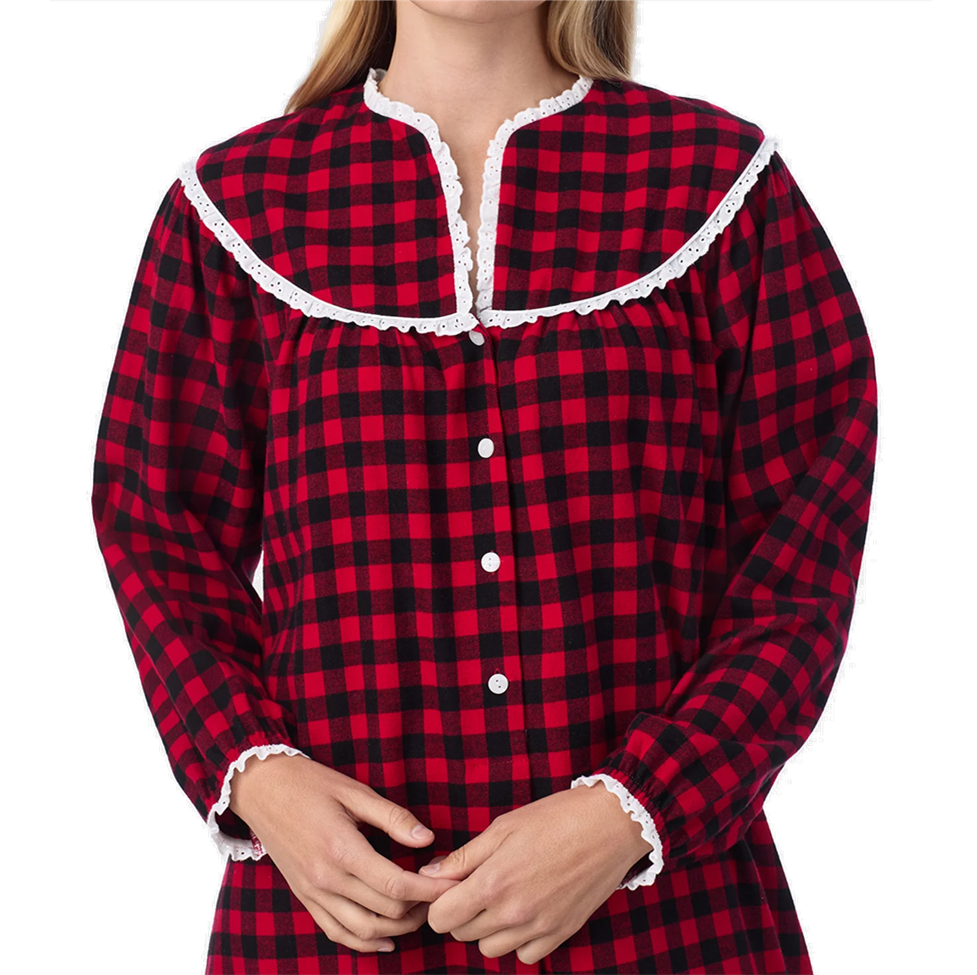 Red and black plaid shirt with white lace trim on a white background